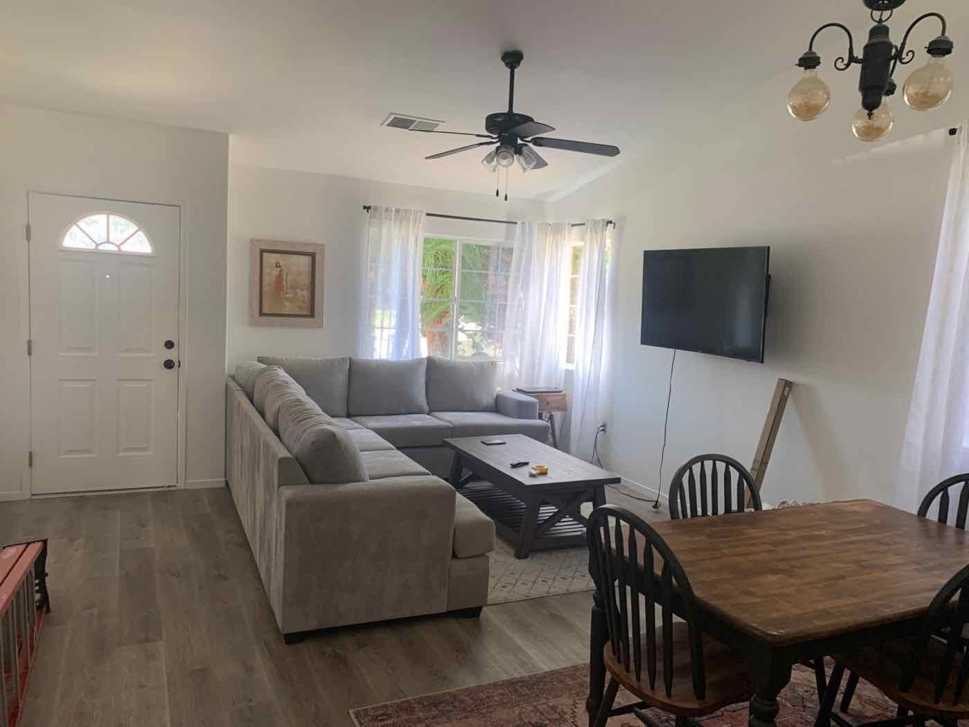 Living and dining room freshly painted in clean bright white